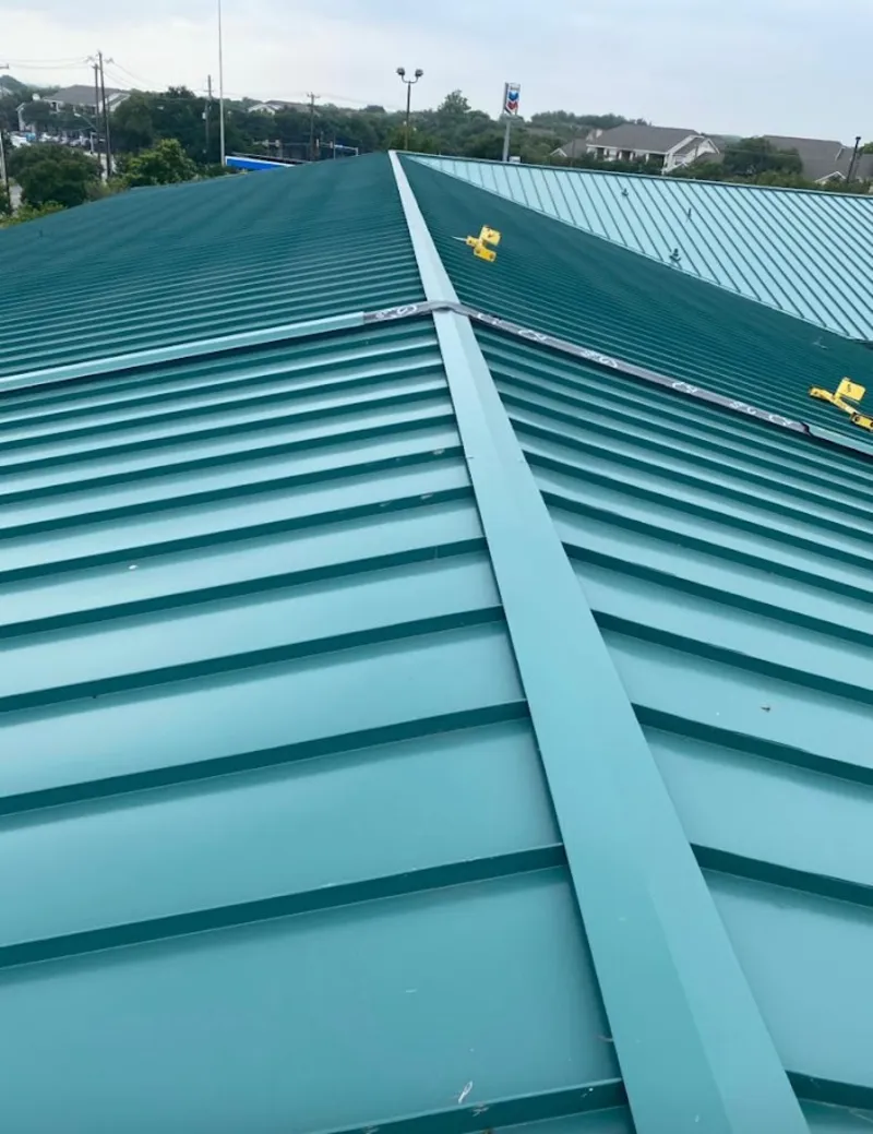 Green commercial metal roof ridge and valley for Metal Roof Repair in Hitchcock